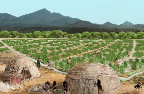 A prehistoric scene showing people farming in fields, with huts and mountains in the background.