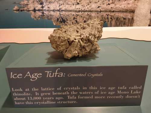 A rock labeled "Ice Age Tufa" with a description about its crystalline structure and formation beneath Mono Lake.