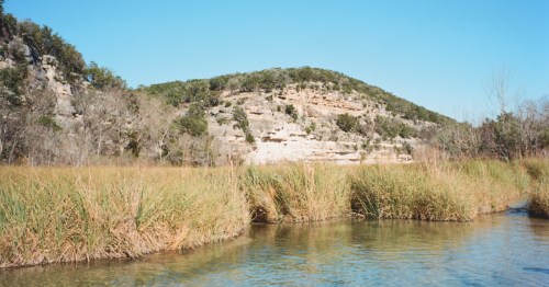 view of guadalupe river in hunt texas on a sunny day