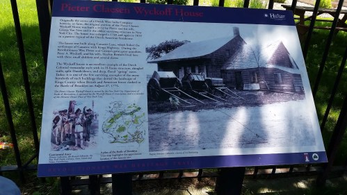 Sign about the Pieter Claesen Wyckoff House, detailing its history and significance in the Revolutionary War.