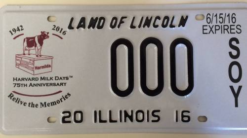 Illinois license plate featuring "Land of Lincoln," with a cow logo and "Harvard Milk Days" 75th anniversary.