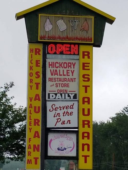 Sign for Hickory Valley Restaurant and Store, featuring "Open Daily" and "Served in the Pan" messages.