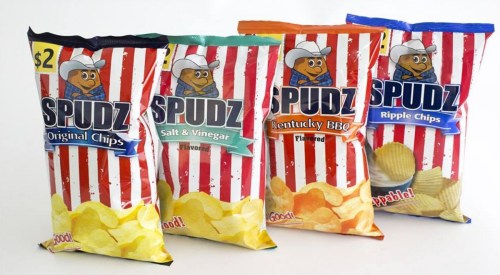 Four bags of Spudz chips in red and white striped packaging, featuring flavors: Original, Salt & Vinegar, Kentucky BBQ, and Ripple Chips.