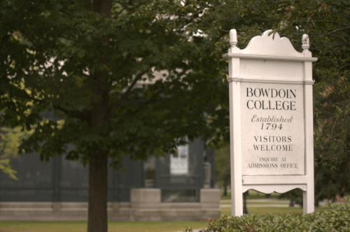 Sign for Bowdoin College, established in 1794, welcoming visitors and directing inquiries to the admissions office.
