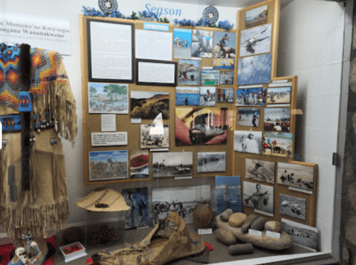 Display featuring historical photos, artifacts, and information about local culture and fishing practices.
