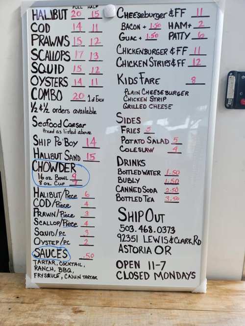 Menu board featuring seafood dishes, burgers, sides, and drinks with prices listed. Closed Mondays.