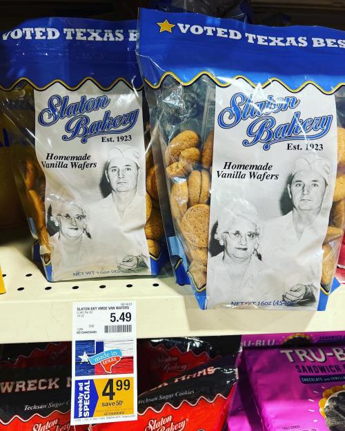 Two bags of Slaton Bakery Homemade Vanilla Wafers on a store shelf, featuring a vintage black-and-white photo of a couple.