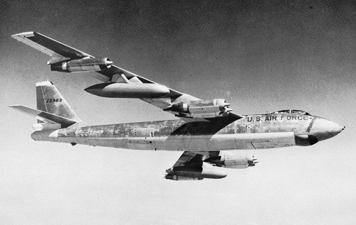 A vintage U.S. Air Force aircraft in flight, featuring a distinctive design with multiple engines and a sleek fuselage.