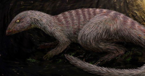 A furry, dinosaur-like creature with stripes, crouching in a dark, natural environment.