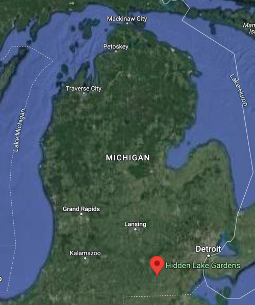Map of Michigan highlighting Hidden Lake Gardens near the center, with surrounding lakes and cities labeled.
