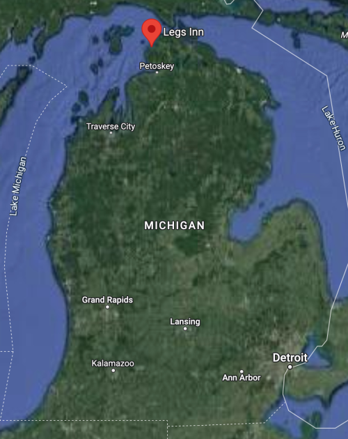 Map of Michigan highlighting Legs Inn near Petoskey, with major cities like Detroit and Grand Rapids marked.