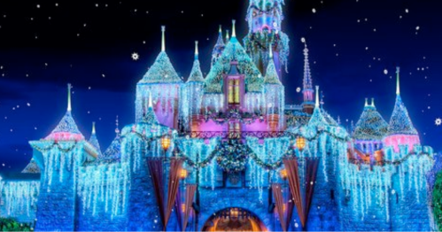 A beautifully lit castle adorned with ice and snow decorations, set against a starry night sky.