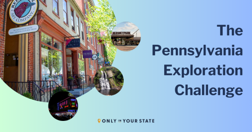 A vibrant street scene in Pennsylvania featuring shops and signs, promoting the Pennsylvania Exploration Challenge.