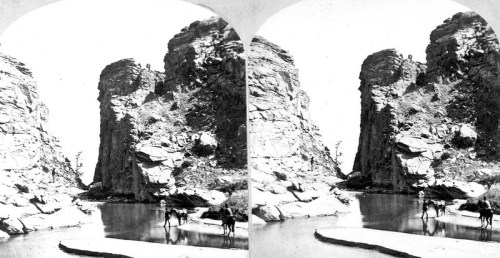 Two black-and-white images of a rocky landscape with a river, featuring two horses and riders near the water's edge.