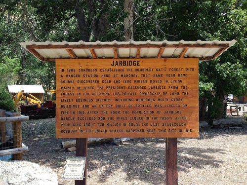 Sign about Jarbridge, detailing its history, gold discovery, and the impact on the local area and buildings.