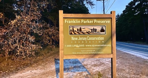Sign for Franklin Parker Preserve, New Jersey Conservation Foundation, with contact info and partnership details.