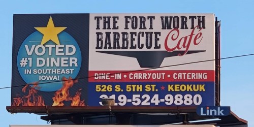 Billboard for The Fort Worth Barbecue Cafe, promoting dine-in, carryout, and catering services in Keokuk, Iowa.