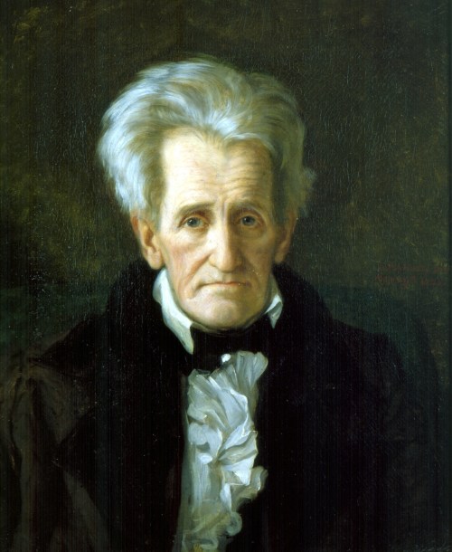 Portrait of an elderly man with white hair, wearing a black coat and white cravat, set against a dark background.