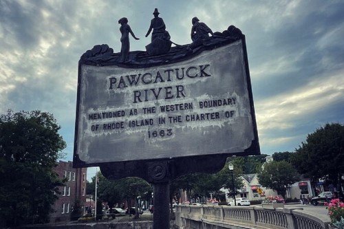 Historical sign for Pawcatuck River, noting its significance as Rhode Island's western boundary since 1663.