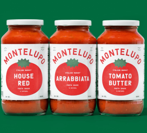Three jars of Montelupo pasta sauce: House Red, Arrabbiata, and Tomato Butter, against a green background.