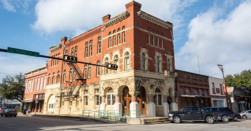 a building by the main street in small town Waxahachie, texas