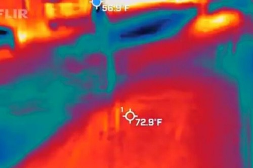 Thermal image showing varying temperatures, with readings of 56.9°F and 72.8°F in a colorful heat map.