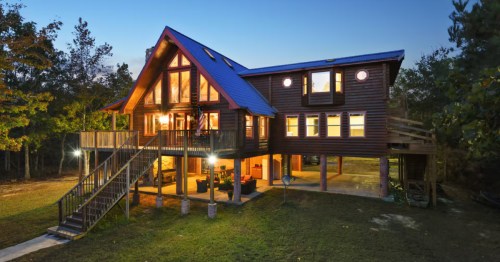 a large luxury cabbin in the evening in waveland ms