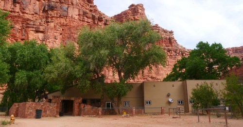view of a church in supai village surrounded byy walls of the grand canyon in arizona