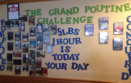 Wall display featuring photos of participants in the Grand Poutine Challenge, with text highlighting the challenge details.