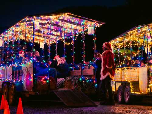 Two brightly lit trailers decorated with colorful lights, with people inside enjoying the festive atmosphere.