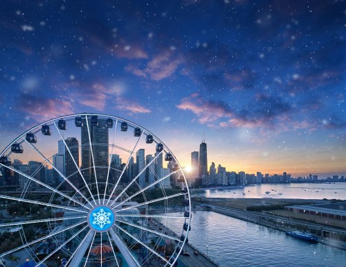 A ferris wheel overlooks a city skyline at sunset, with snowflakes gently falling in the foreground.