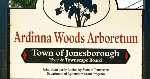 Sign for Ardinna Woods Arboretum in Jonesborough, Tennessee, highlighting its funding and purpose.
