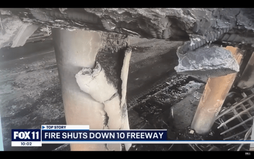 Image of a damaged freeway overpass due to fire, with charred pillars and debris visible. News banner at the bottom.