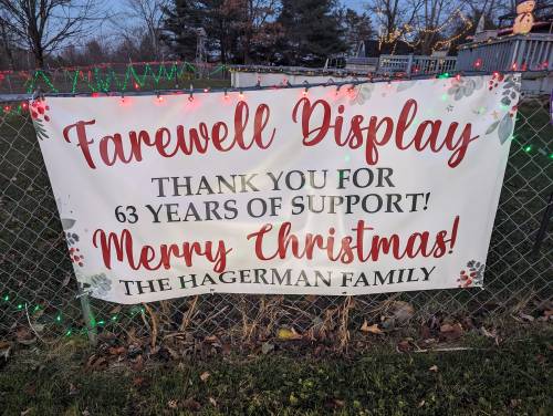 Banner reading "Farewell Display, Thank You for 63 Years of Support! Merry Christmas! The Hagerman Family" with festive decorations.