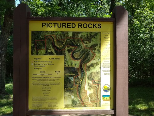 Map of Pictured Rocks showing trails, public lands boundary, and river access in a wooded area.