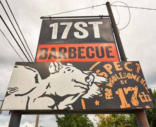 Sign for 17th Street Barbecue featuring a pig illustration and the words "Respect for Wholesome BBQ."