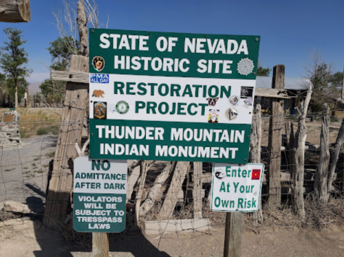 Sign for Thunder Mountain Indian Monument in Nevada, noting it's a historic site and restoration project.