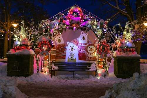 A festive winter scene with colorful lights, decorated bears, and a snowy pathway leading to a cozy bench.