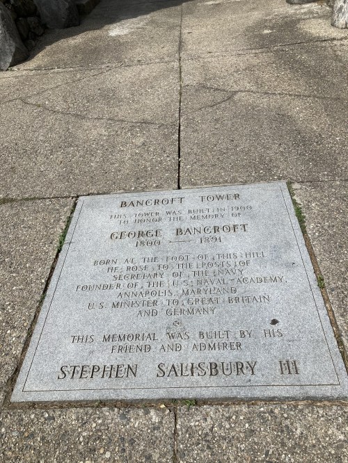 A stone plaque commemorating George Bancroft, detailing his achievements and honoring him by Stephen Salisbury III.