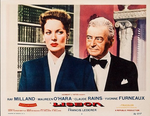 A vintage movie poster featuring a woman and a man in formal attire, with the title "Lisbon" prominently displayed.