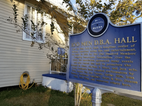 Sign for 100 Men D.B.A. Hall, a historic center for African American music and entertainment in Mississippi.