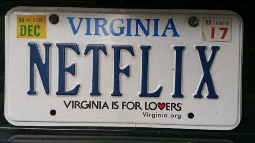 Virginia license plate reading "NETFLIX" with the slogan "Virginia is for Lovers" at the bottom.