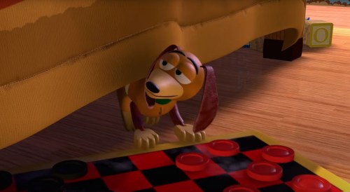 A cartoon dog peeks out from under a couch, with a checkers board visible on the floor.