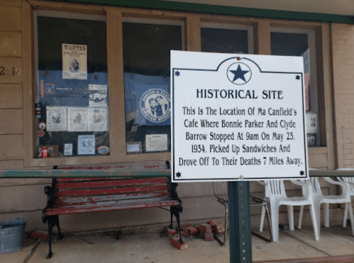 Sign marking the historical site of Ma Canfield's Cafe, where Bonnie and Clyde stopped on May 25, 1934.