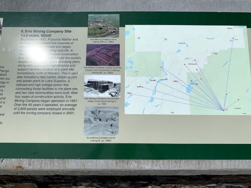 Information board about the Erie Mining Company, detailing its history, location, and construction timeline.