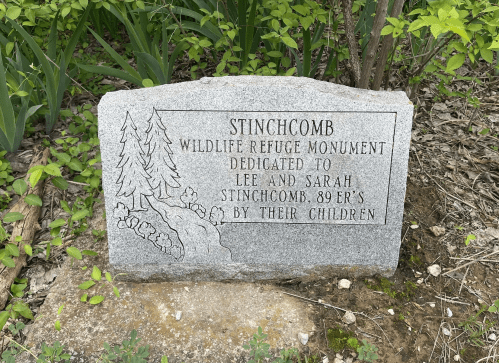 Granite monument for Stinchcomb Wildlife Refuge, dedicated to Lee and Sarah Stinchcomb by their children.