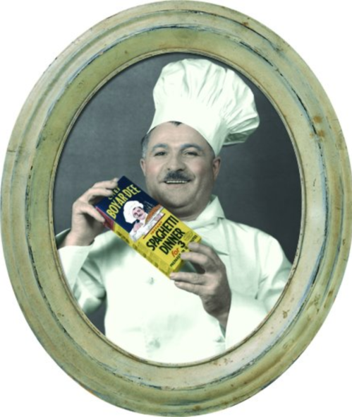 A smiling chef in a white coat and hat holds a box of spaghetti, framed in an oval portrait.