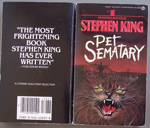 Cover of "Pet Sematary" by Stephen King, featuring a fierce cat and bold text about the book's frightening nature.