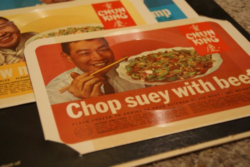 Vintage advertisement for Chun King featuring a man holding chopsticks and a plate of chop suey with beef.