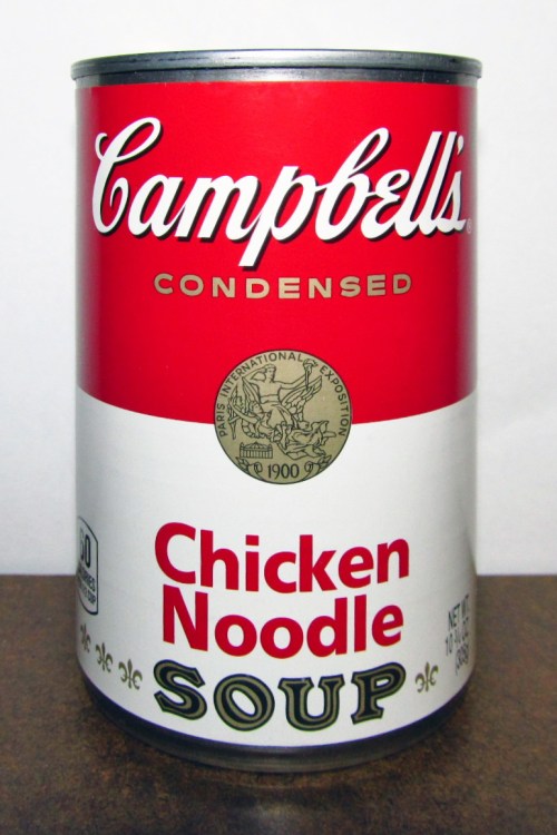 A can of Campbell's condensed chicken noodle soup with a red and white label.